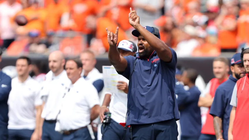 Sep 8, 2024; Cincinnati, Ohio, USA;  New England Patriots head coach Jerod Mayo call a play during the second quarter against the Cincinnati Bengals at Paycor Stadium. Mandatory Credit: Joseph Maiorana-Imagn Images