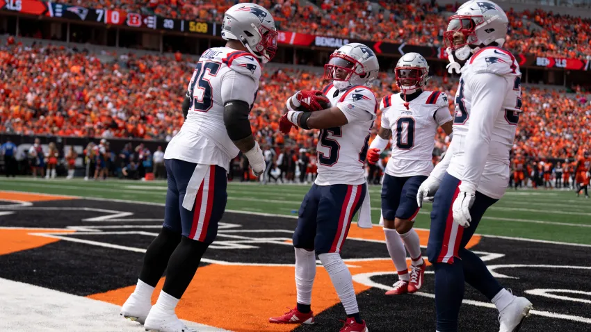 New England Patriots corner back Marcus Jones (25) recovers a fumble in the second quarter of the NFL game against the Cincinnati Bengals at Paycor Stadium in Cincinnati on Sunday, Sept. 8, 2024.