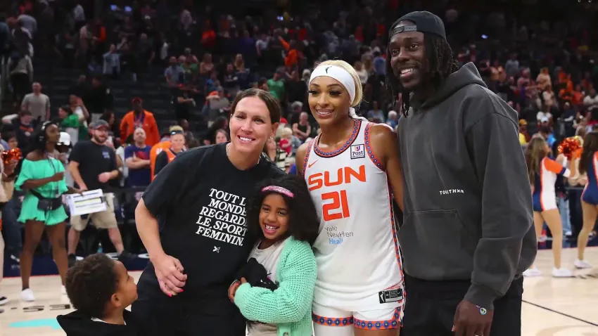 Jrue Holiday with his family and Sun guard DiJonai Carrington