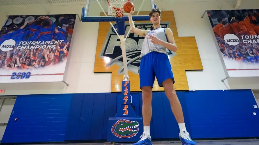 Olivier Rioux, 7-foot-9 NCAA college basketball player at Florida, poses for a photo after practice, Friday, Oct. 18, 2024, in Gainesville, Fla.