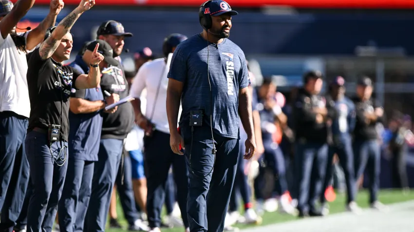 Oct 6, 2024; Foxborough, Massachusetts, USA; New England Patriots head coach Jerod Mayo watches the game against the Miami Dolphins during the second half at Gillette Stadium. Mandatory Credit: Brian Fluharty-Imagn Images