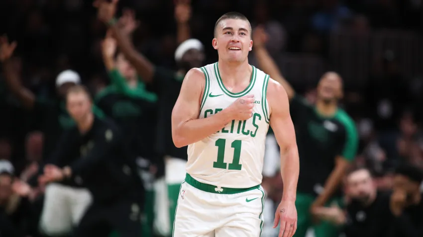 Oct 28, 2024; Boston, Massachusetts, USA; Boston Celtics guard Payton Pritchard (11) reacts after a shot during the first half against the Milwaukee Bucks at TD Garden. Mandatory Credit: Paul Rutherford-Imagn Images