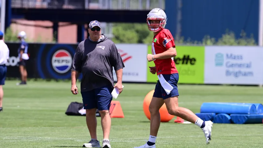 Jun 10, 2024; Foxborough, MA, USA; New England Patriots quarterback Drake Maye (10) works out as offensive coordinator Alex Van Pelt watches at minicamp at Gillette Stadium. Mandatory Credit: Eric Canha-USA TODAY Sports