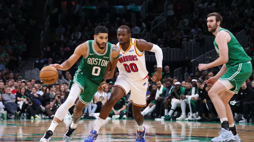 Nov 6, 2024; Boston, Massachusetts, USA; Boston Celtics forward Jayson Tatum (0) drives to the basket during the first half against the Golden State Warriors at TD Garden. Mandatory Credit: Paul Rutherford-Imagn Images