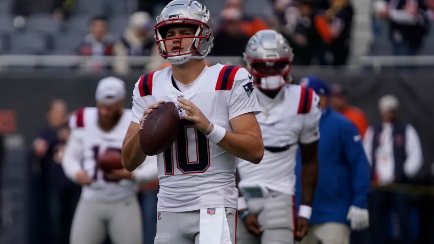 Nov 10, 2024; Chicago, Illinois, USA; New England Patriots quarterback Drake Maye (10) warms up before the game against the Chicago Bears at Soldier Field. Mandatory Credit: David Banks-Imagn Images