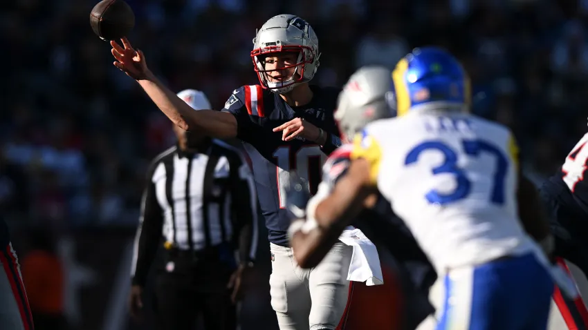 Nov 17, 2024; Foxborough, Massachusetts, USA; New England Patriots quarterback Drake Maye (10) throws the ball against the Los Angeles Rams during the first half at Gillette Stadium. Mandatory Credit: Brian Fluharty-Imagn Images