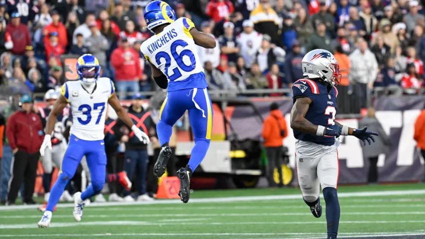 Nov 17, 2024; Foxborough, Massachusetts, USA;  Los Angeles Rams safety Kamren Kinchens (26) intercepts a pass during the second half against the New England Patriots at Gillette Stadium. Mandatory Credit: Eric Canha-Imagn Images