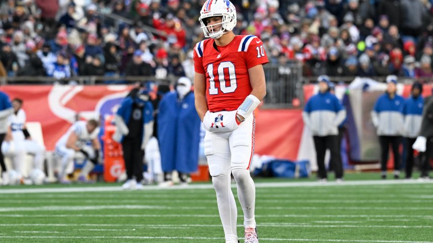 Dec 1, 2024; Foxborough, Massachusetts, USA; New England Patriots quarterback Drake Maye (10) waits for game action to resume during the second half against the Indianapolis Colts at Gillette Stadium. Mandatory Credit: Eric Canha-Imagn Images