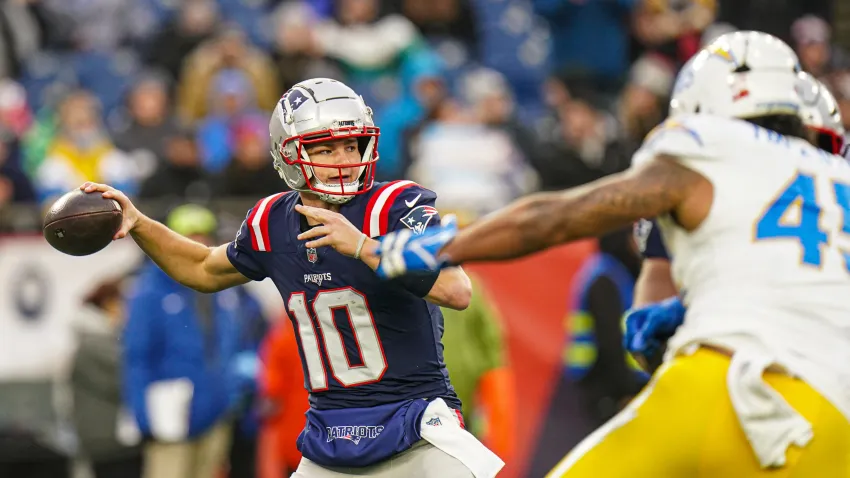 Dec 28, 2024; Foxborough, Massachusetts, USA; New England Patriots quarterback Drake Maye (10) passes the ball against the Los Angeles Chargers in the second half at Gillette Stadium. Mandatory Credit: David Butler II-Imagn Images