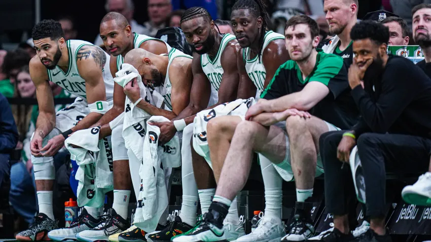 Jan 10, 2025; Boston, Massachusetts, USA; The Boston Celtics bench in the final seconds of the game against the Sacramento Kings at TD Garden. Mandatory Credit: David Butler II-Imagn Images