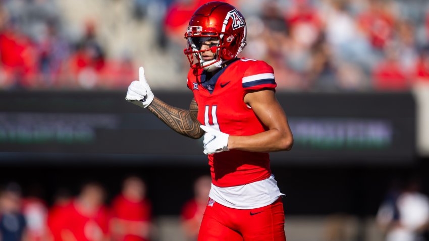 Nov 30, 2024; Tucson, Arizona, USA; Arizona Wildcats wide receiver Tetairoa McMillan (4) against the Arizona State Sun Devils during the Territorial Cup at Arizona Stadium. Mandatory Credit: Mark J. Rebilas-Imagn Images