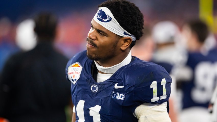 Dec 31, 2024; Glendale, AZ, USA; Penn State Nittany Lions defensive end Abdul Carter (11) reacts after suffering an injury against the Boise State Broncos in the Fiesta Bowl at State Farm Stadium. Mandatory Credit: Mark J. Rebilas-Imagn Images