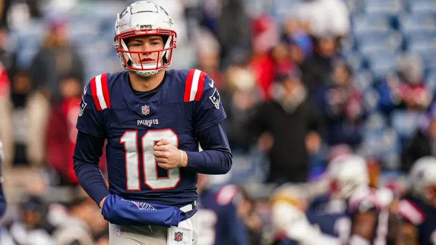 Jan 5, 2025; Foxborough, Massachusetts, USA; New England Patriots quarterback Drake Maye (10) warms up before the start of the game against the Buffalo Bills at Gillette Stadium. Mandatory Credit: David Butler II-Imagn Images