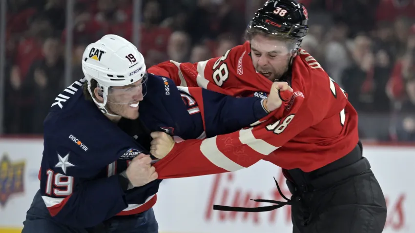 Feb 15, 2025; Montreal, Quebec, CAN; [Imagn Images direct customers only] Team United States forward Matthew Tkachuk (19) and Team Canada forward brandon Hagel (38) fight in the first period during a 4 Nations Face-Off ice hockey game at the Bell Centre. Mandatory Credit: Eric Bolte-Imagn Images