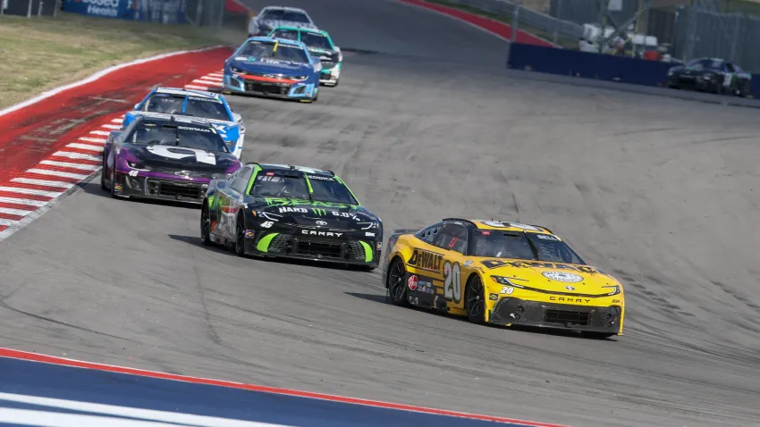 Christopher Bell leads a pack of cars at COTA