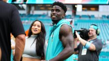 MIAMI GARDENS, FLORIDA - AUGUST 09: Tyreek Hill #10 of the Miami Dolphins and Keeta Vaccaro look on prior to a preseason game between the Miami Dolphins and the Atlanta Falcons at Hard Rock Stadium on August 09, 2024 in Miami Gardens, Florida. (Photo by Rich Storry/Getty Images)