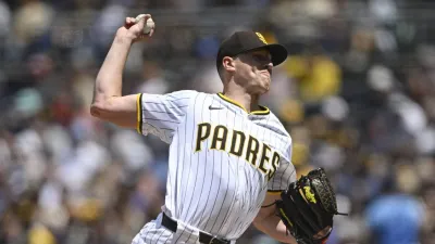 Apr 16, 2025; San Diego, California, USA; San Diego Padres starting pitcher Nick Pivetta (27) delivers during the second inning against the Chicago Cubs at Petco Park. Mandatory Credit: Denis Poroy-Imagn Images