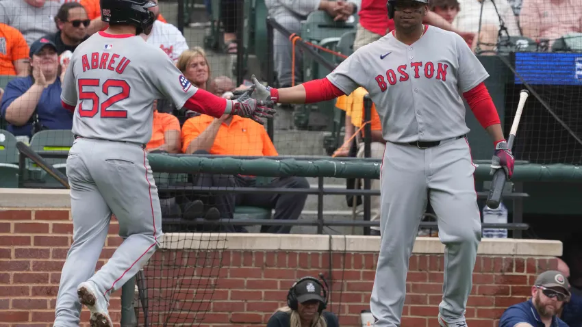 Apr 3, 2025; Baltimore, Maryland, USA; Boston Red Sox outfielder Wilyer Abreau (52) greeted in the fourth inning by designated hitter Rafael Devers (11) after scoring against the Baltimore Orioles at Oriole Park at Camden Yards. Mandatory Credit: Mitch Stringer-Imagn Images