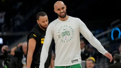Celtics guard Derrick White and Warriors guard Stephen Curry