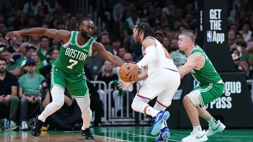 Oct 22, 2024; Boston, Massachusetts, USA; Boston Celtics guard Jaylen Brown (7) steals the ball from New York Knicks guard Jalen Brunson (11) in the second quarter at TD Garden. Mandatory Credit: David Butler II-Imagn Images