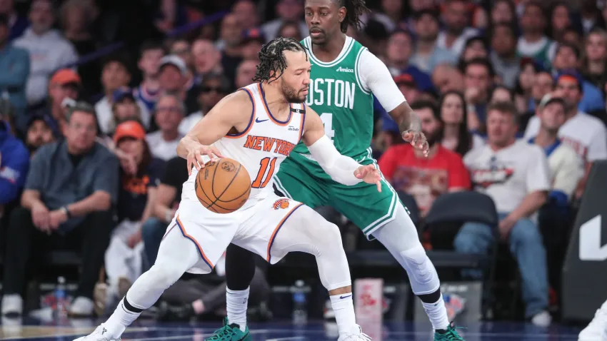 May 10, 2025; New York, New York, USA; New York Knicks guard Jalen Brunson (11) looks to drive past Boston Celtics guard Jrue Holiday (4) in the third quarter during game three of the second round for the 2025 NBA Playoffs at Madison Square Garden. Mandatory Credit: Wendell Cruz-Imagn Images