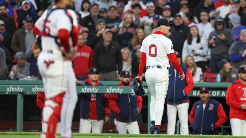 May 20, 2025; Boston, Massachusetts, USA; Boston Red Sox starting pitcher Walker Buehler (0) walks off the field after being ejected during the third inning against the New York Mets at Fenway Park. Mandatory Credit: Paul Rutherford-Imagn Images