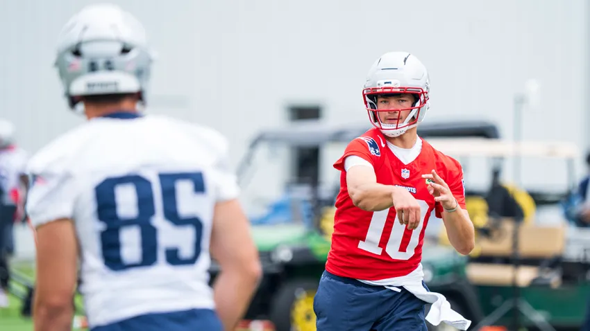 Patriots tight end Hunter Henry and quarterback Drake Maye