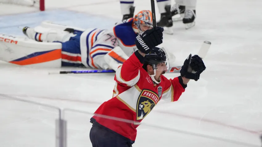 Jun 9, 2025; Sunrise, Florida, USA; Florida Panthers forward Brad Marchand (63) celebrates scoring against Edmonton Oilers goaltender Stuart Skinner (74) during the first period in game three of the 2025 Stanley Cup Final at Amerant Bank Arena. Mandatory Credit: Jim Rassol-Imagn Images