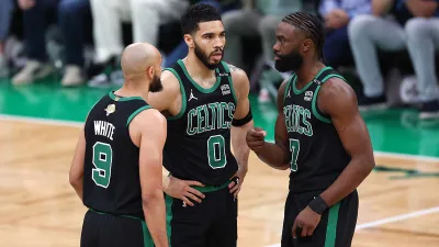 Celtics teammates Derrick White, Jayson Tatum and Jaylen Brown