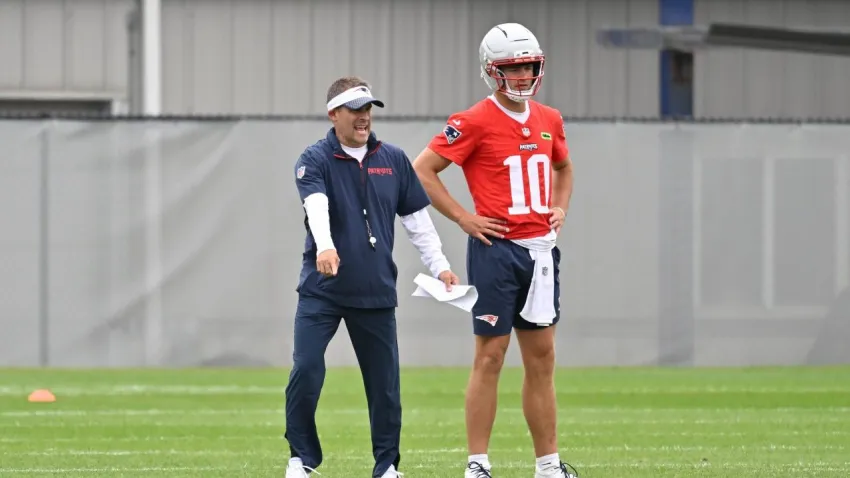 Jun 9, 2025; Foxborough, MA, USA; New England Patriots offensive coordinator Josh McDaniels directs a drill for quarterback Drake Maye (10) during minicamp at Gillette Stadium. Mandatory Credit: Eric Canha-Imagn Images