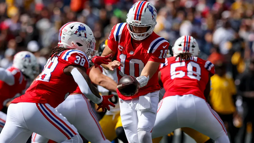 Patriots running back Rhamondre Stevenson and quarterback Drake Maye