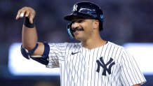 Aug 11, 2025; Bronx, New York, USA; New York Yankees center fielder Trent Grisham (12) celebrates his RBI single against the Minnesota Twins during the seventh inning at Yankee Stadium. Mandatory Credit: Brad Penner-Imagn Images