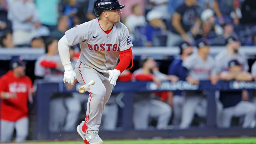 Sep 30, 2025; Bronx, New York, USA; Boston Red Sox third base Alex Bregman (2) hits an RBI double during the ninth inning against the New York Yankees during game one of the Wildcard round for the 2025 MLB playoffs at Yankee Stadium. Mandatory Credit: Brad Penner-Imagn Images