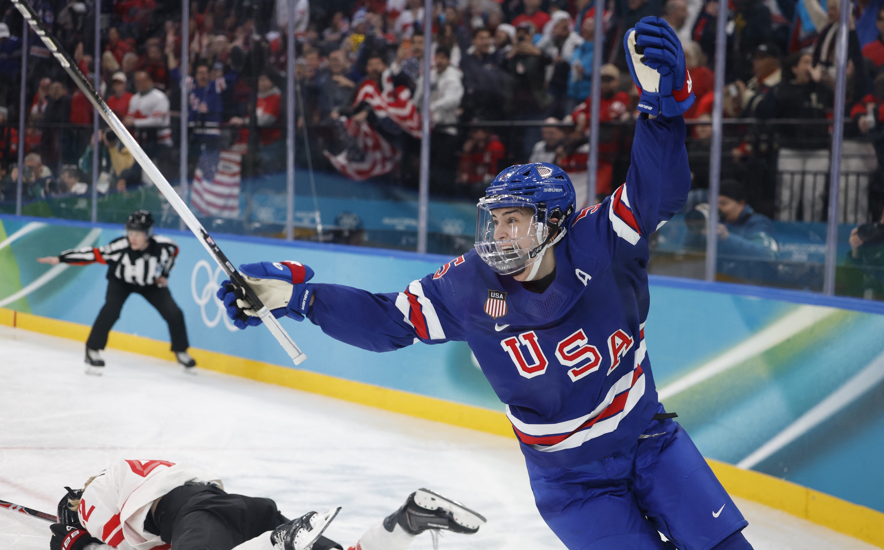 Megan Keller celebrates after scoring the game-winning goal for the United States against Canada in the women's ice hockey gold medal game during the 2026 Milan Cortina Olympic Winter Games