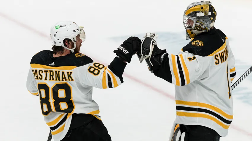 David Pastrnak and Jeremy Swayman