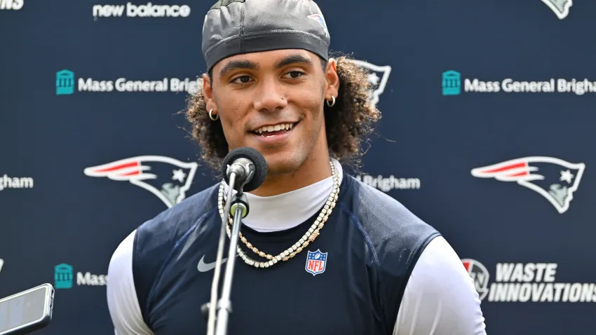 Jul 28, 2026; Foxborough, MA, USA; New England Patriots cornerback Christian Gonzalez (0) speaks to the media after practice at training camp at Gillette Stadium. Mandatory Credit: Eric Canha-Imagn Images