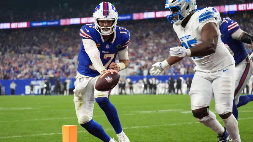 Josh Allen (17) runs to score a touchdown vs. Detroit.