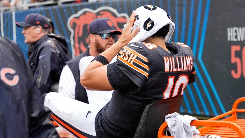 Caleb Williams of the Chicago Bears is carted off the field